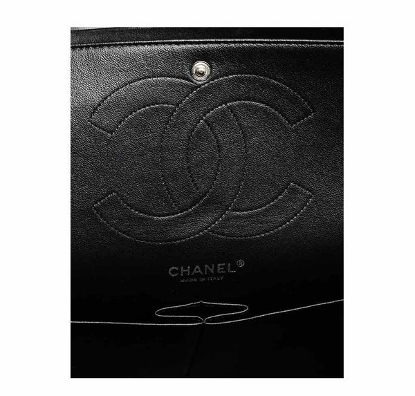 chanel jumbo classic flap bag black used logo