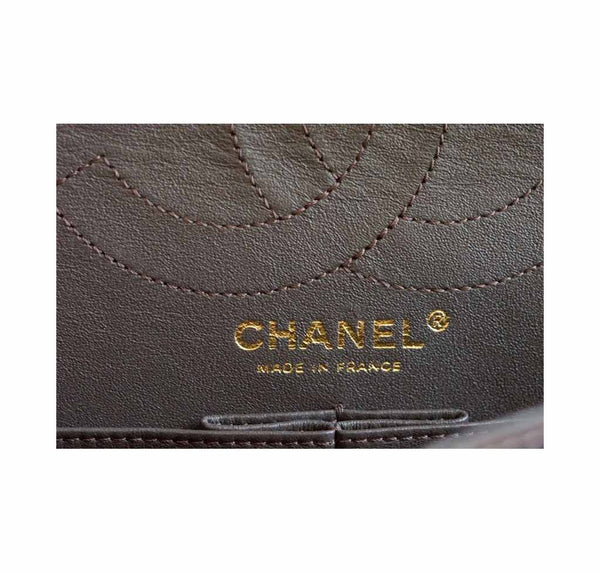 chanel medium double flap brown used embossing