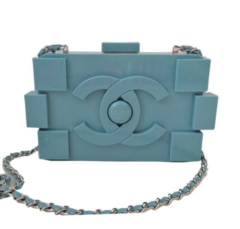 A RUNWAY PEARL & BLACK LUCITE LEGO CLUTCH WITH SILVER HARDWARE