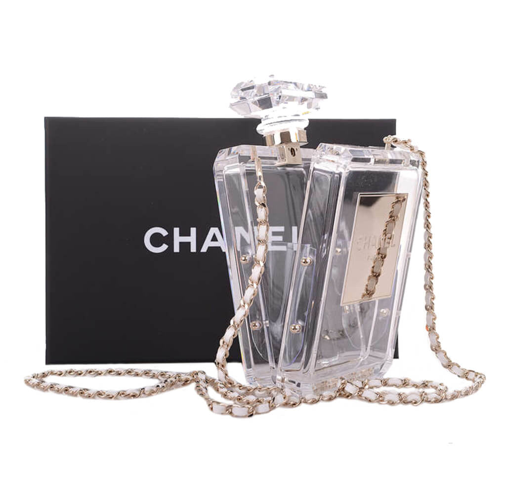 Can you spot the bag? 😉👛 Chanel Perfume bottle bag plexiglas 🖤 on line @  www.designerwishbags.com #chanel #perfume #perfumebottle # perfumebottlebag