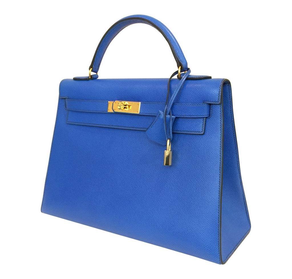 Chic NEW Authentic HERMES Blue Tempete e Canvas Strap Kelly bag 32 cm  PHW — Sergei Luxury
