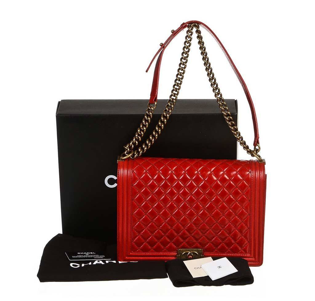 Chanel Boy GM bag in black smooth leather with red trim  DOWNTOWN UPTOWN  Genève