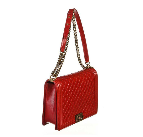 chanel quilted boy bag red used side
